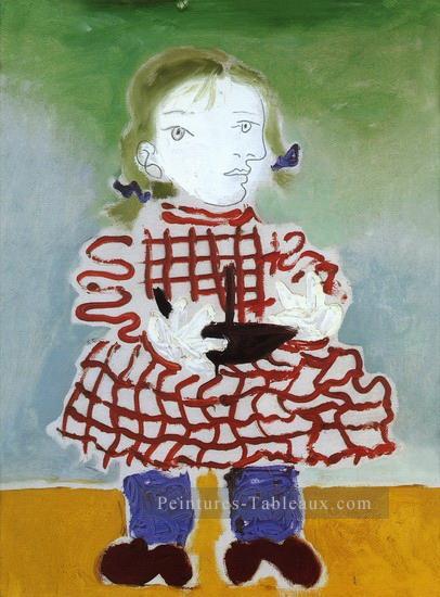 Maya en tablier rouge 1938 cubisme Pablo Picasso Peintures à l'huile